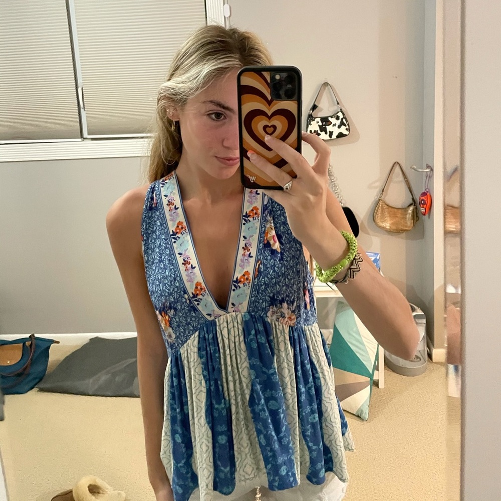 Free people top size S never worn!!